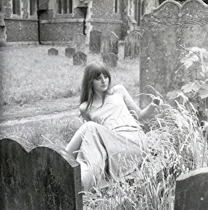 Slim: Model posing in a graveyard