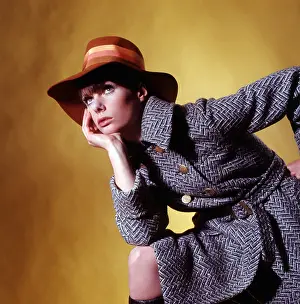 Funky: Model posing in tweed coat, 1970s