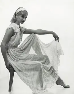 Nightgown: Model in sheer fabric nightgown and white headband