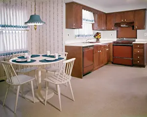 Dishwasher: Model Showroom Kitchen with Dated Brown Appliances