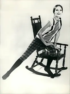 Suede: Model in after ski costume, vest, knickerbockers and boots