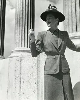 Woolen: A model in a very smart suit - neo-classical columns
