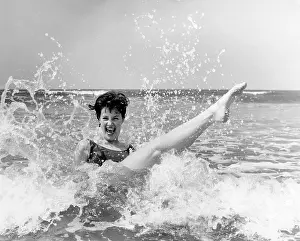 Emberton: Model splashing about in the surf