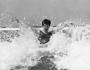 Emberton: Model splashing about in the surf