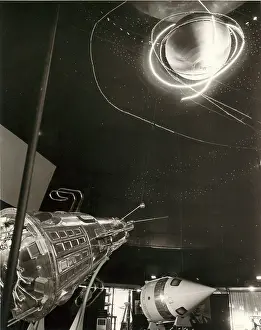 Earls: A model of Sputnik III (foreground)