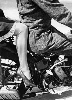 Ladieswear: Model with stocking, 1935