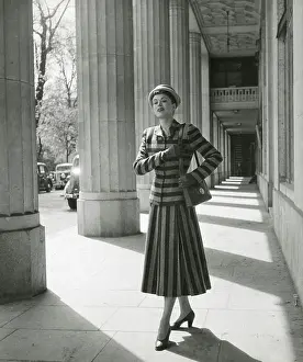 Pleated: Model in a striking striped suit - columns
