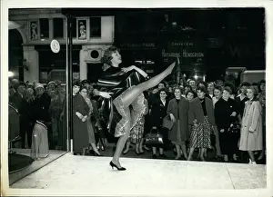 Brushed: Model Susan performs in shop window, Glasgow, Scotland
