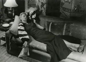 Cushions: Model taking a nap on the sofa in an opulent sitting room