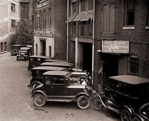 Dealership: Model Ts, and one more luxurious Lincoln ?