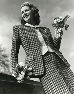 Posies: Model wearing a check two-piece wool suit with posies