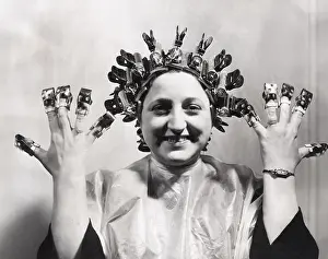 Curlers: Model wears Helene Curtis remote control permanent