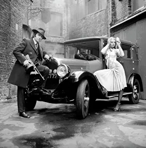 Models pose for a Bonnie & Clyde style shoot