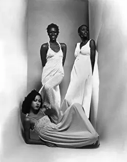 Ruched: Three models sport maxi-dresses with empire ?