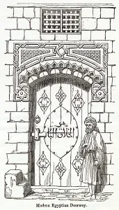 Grille: Modern Egyptian doorway with writing in Arabic