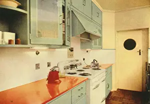 Drawers: A modern fitted kitchen with electric cooker