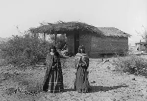 Assimilation: Two Mojave Indians girls stand in front of