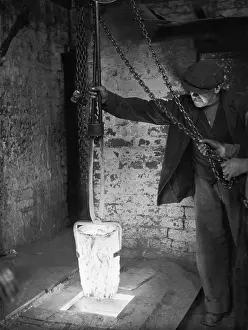 Withdrawing: MOLTEN BRASS FURNACE