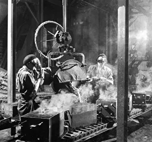 Mould: Molten Metal on a Production Line