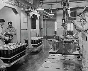 Filling: Molten TNT is poured into 75mm shells, 1943