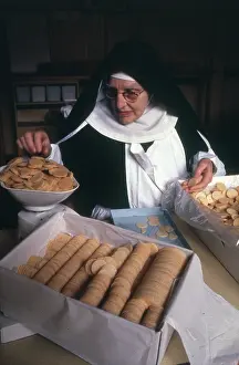 Colin Horsman: Monastic life - nun weighing and packing biscuits