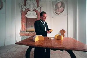 Canons: Monk while tasting cheese made by the canons