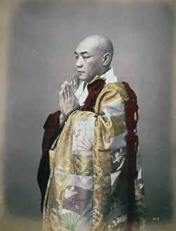 Promontory: Monk, three-quarter length studio portrait, standing, facing