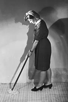 Mopping: MOPPING LINOLEUM 1940S