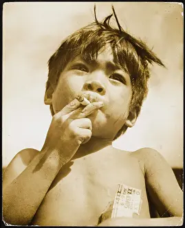 Bribed: MORO BOY SMOKING