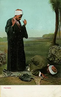 Devout: Two Moslems at prayer, Egypt