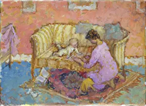 Crawling: Mother with baby crawling on a sofa