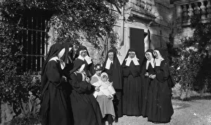 Nuns: Mother, baby and nuns