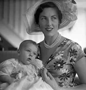 Christening: Mother and child after a christening