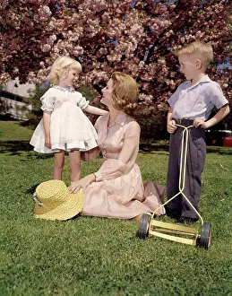 Lawnmower: Mother And Children Outdoors