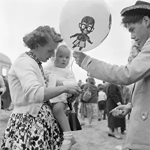 Whitsun: Mother, Daughter And Balloon