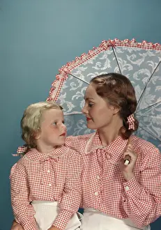 Checker: Mother And Daughter Dressed Alike