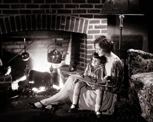 Storybook: Mother and Daughter Sit Together on Floor Before Warm Fire