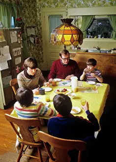 Moms: Mother Father Three Children Having Breakfast
