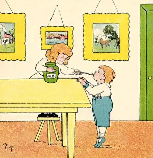 Feeds: Mother feeding her small son a spoonful of jam