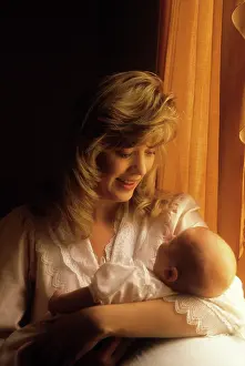 Tay001: Mother holding baby