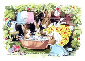 Towels: Mother rabbit bathing young rabbits