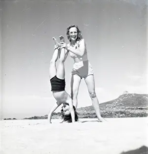 Handstand: Mother and son doing handstand