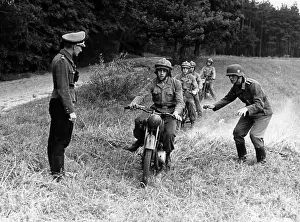 Clutch: Motor HJ members during a training ride, 1942