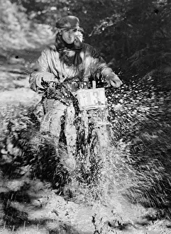 Carshalton: Motorcycle driving through mud