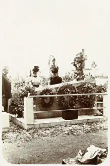 Relative: MOURNING AT GRAVE