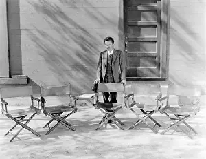 Absent: Empty movie director chairs