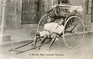 Lourenco: Mozambique - Maputo - Two Rickshaw Boys take a nap
