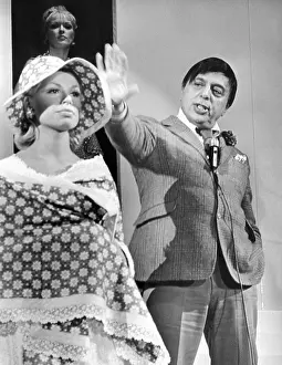 Mr. John, the famous milliner with one of ?