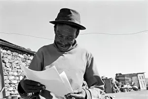 Molefe: Mr Modikwane Molefe looks at photographs of himself