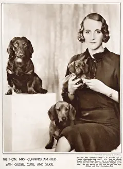 Nov18: Mrs Cunningham Reid with her dachshunds